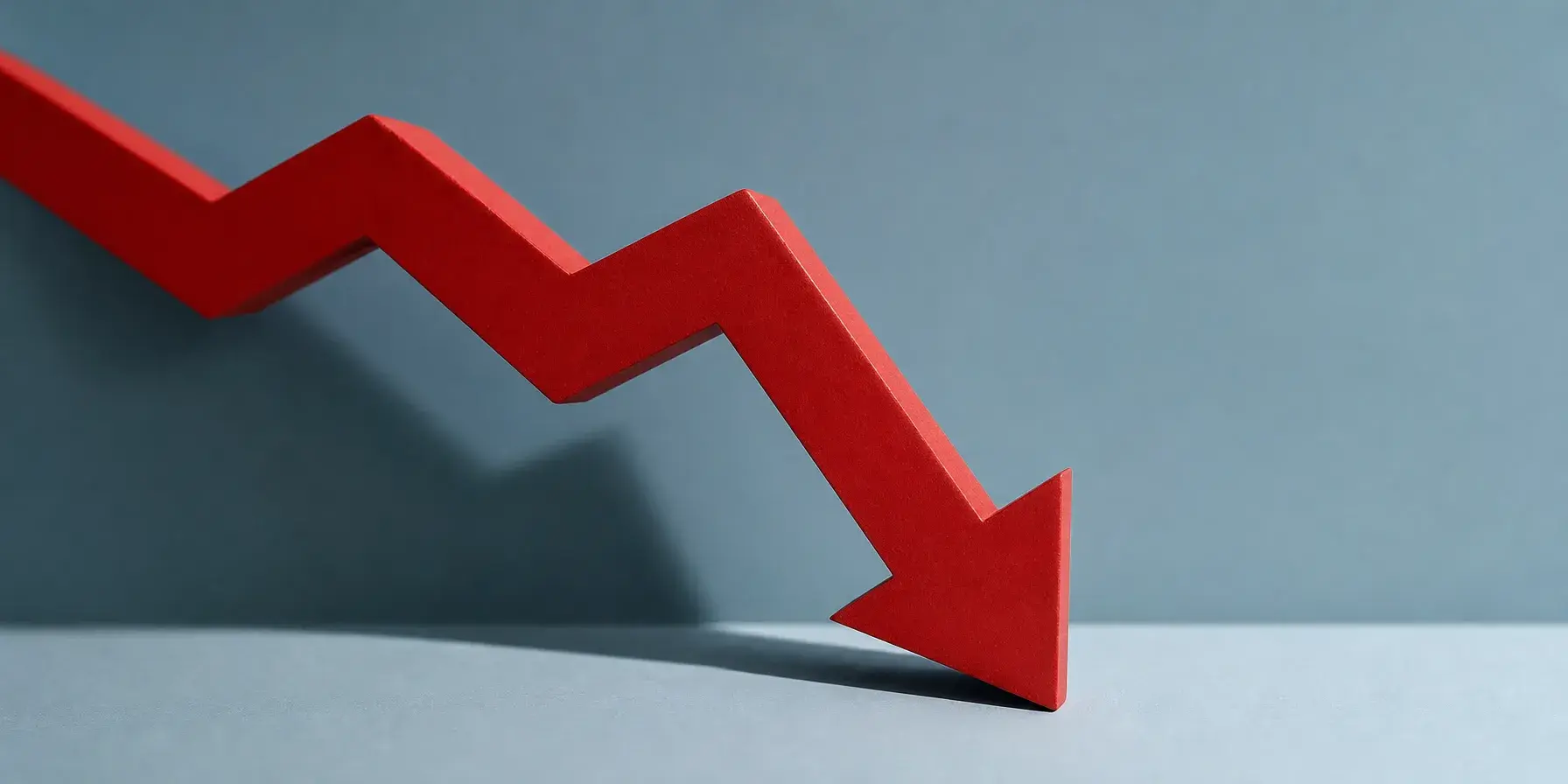Red zigzag arrow pointing downward, symbolizing a sharp decline.